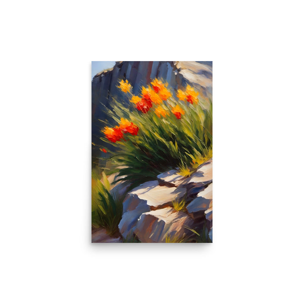 Orange flowers with a fiery colored bloom with a rugged cliff background.