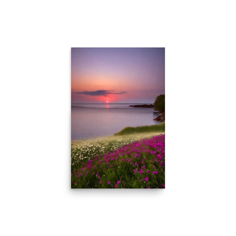 A sunset over a tranquil sea with pink and white flowers under glowing clouds.
