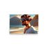 Young man with tanned skin stands relaxed on beach sand. Wavy hair, sunglasses, unbuttoned white shirt. Volcano rises behind him. Palm trees sway nearby as ocean laps at golden sand. Vivid colors evoke tranquil seaside paradise.