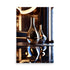 Elegantly curved glass vases rest calmly. Larger amber-hued teardrop shape beautifully complements smaller transparent companion piece. Sleek forms cast captivating reflections in sophisticated ambiance.